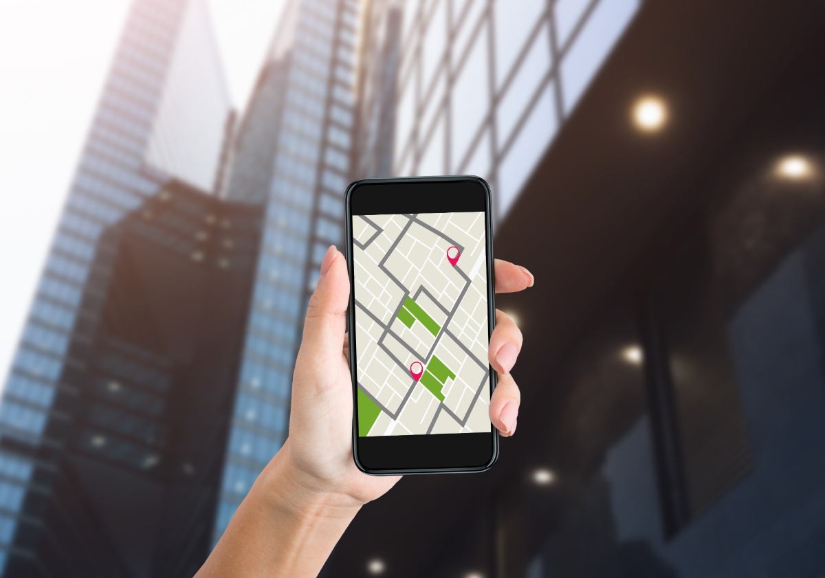 Hand Holding Smartphone With Offline Map Hand Holding Smartphone With Offline Map