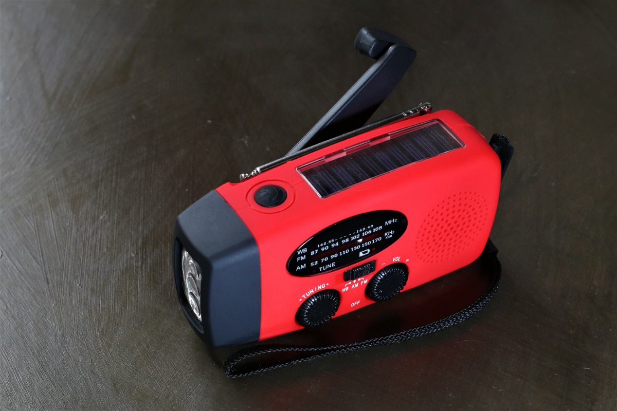 battery-operated radio with flashlight