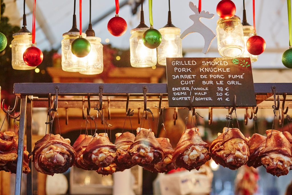 Delicious grilled pork at a Christmas market in Paris.