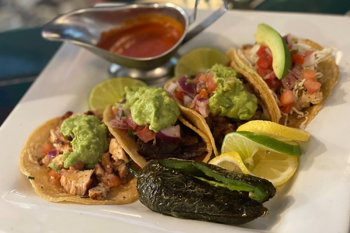 plate of tacos with guacamole and pico de gallo from the spot in la jolla, san diego.