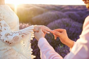 Marriage proposal in a field of lavender