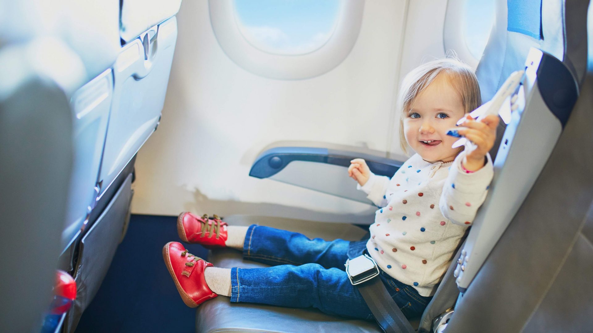 Flying with a Toddler: Airplane Toddler Tips for Happier Flights - Diapers  in Paradise