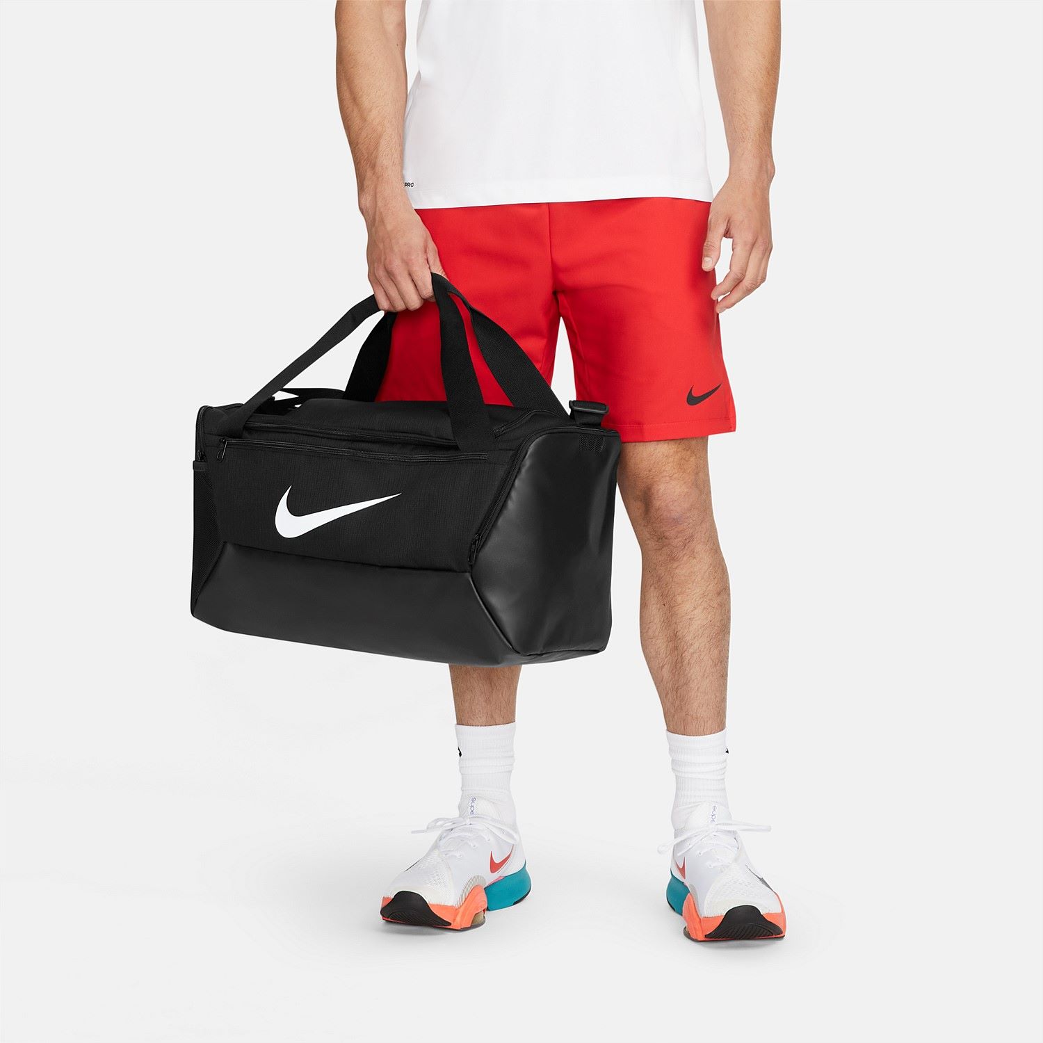 Nike Sportswear Cambodia - Nike Brasilia Convertible Duffel Bag/Backpack  features a spacious main compartment for all the gear you need to get  through the day prepared. Versatile straps let you wear it