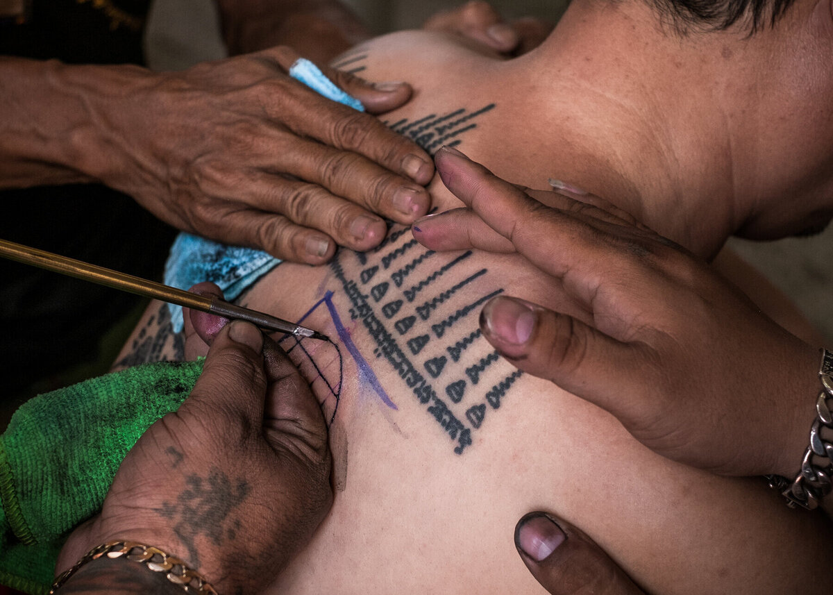 Getting-A-Sak-Yant-Tattoo-From-A-Monk getting-a-sak-yant-tattoo-from-a-monk