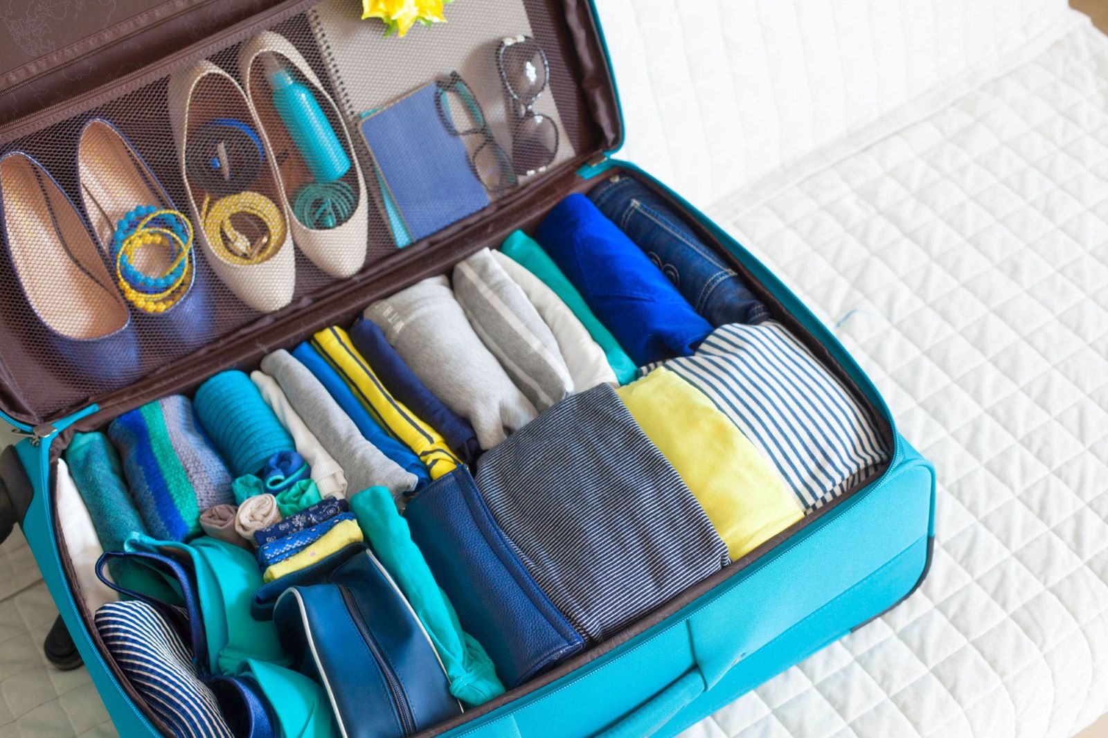 How-To-Fold-Clothes-Into-A-Suitcase how-to-fold-clothes-into-a-suitcase