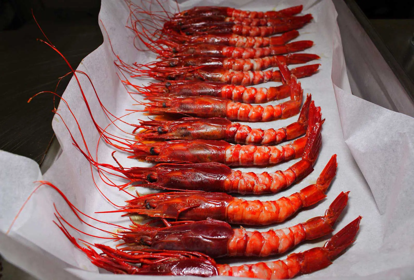 The-Red-Prawns-Are-Organized-By-Size-8211-Small-Medium-Large-And-Extra-Large-8211-Before-Covered-With-Ice-During-The-Transport-Back-To-Port the-red-prawns-are-organized-by-size-small-medium-large-and-extra-large-before-covered-with-ice-during-the-transport-back-to-port