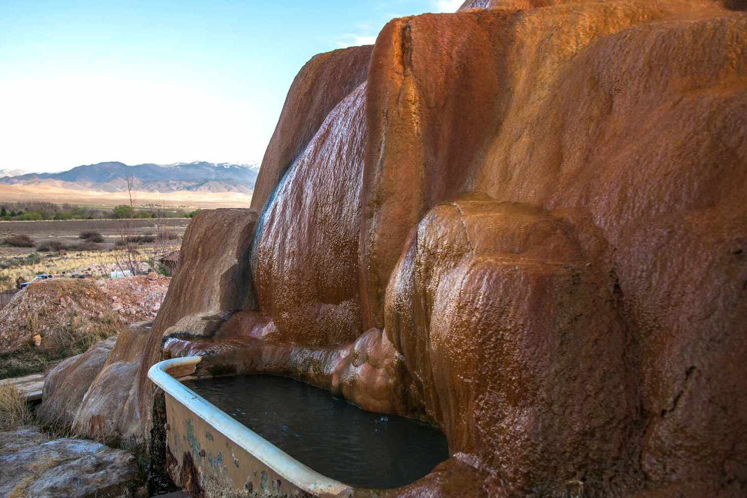 utahs-mystic-hot-springs-vintage-tubs-on-a-hillside