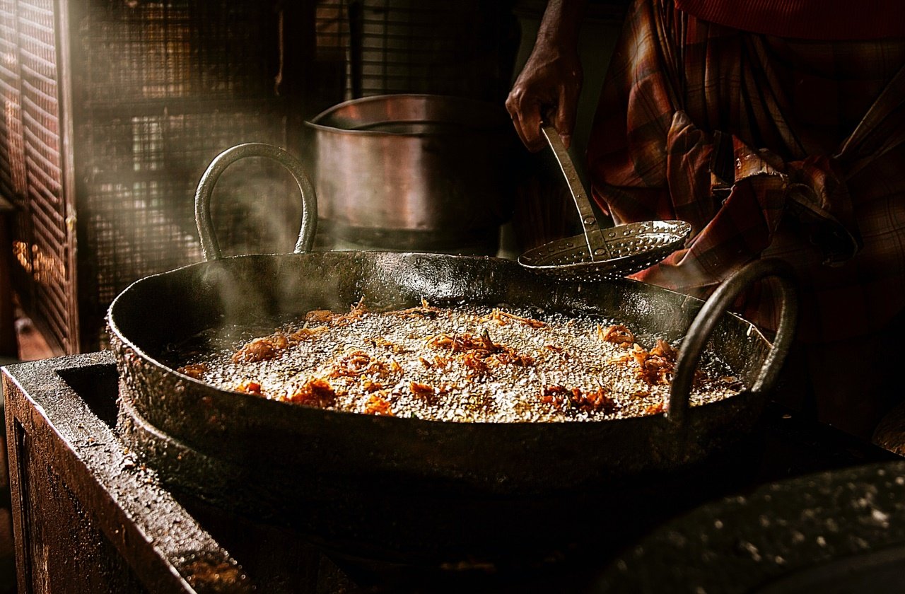 Man cooking street food