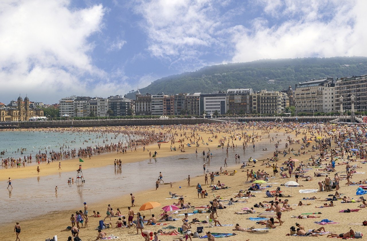 Busy summer day at one of the beaches in San Sebastian