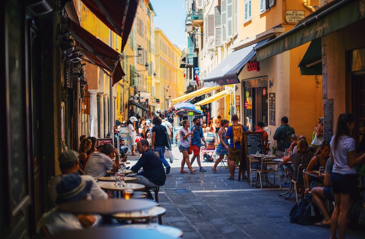 France cafes People in an alleyway in Nice, France
