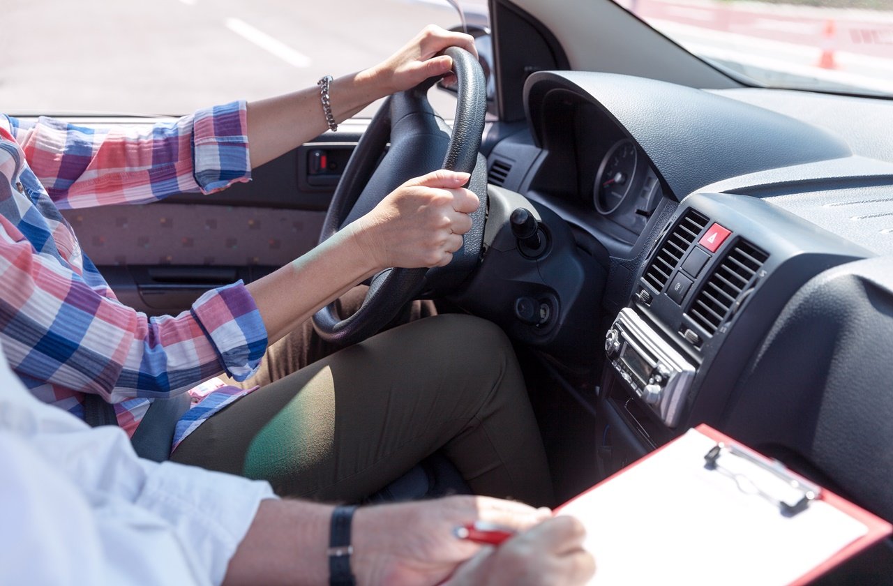 Student driver with instructor