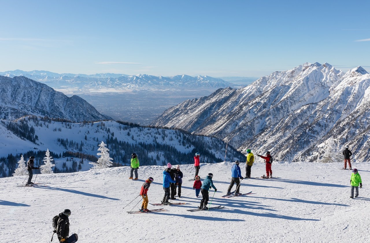 Skiers and snowboarders at a resort in Utah