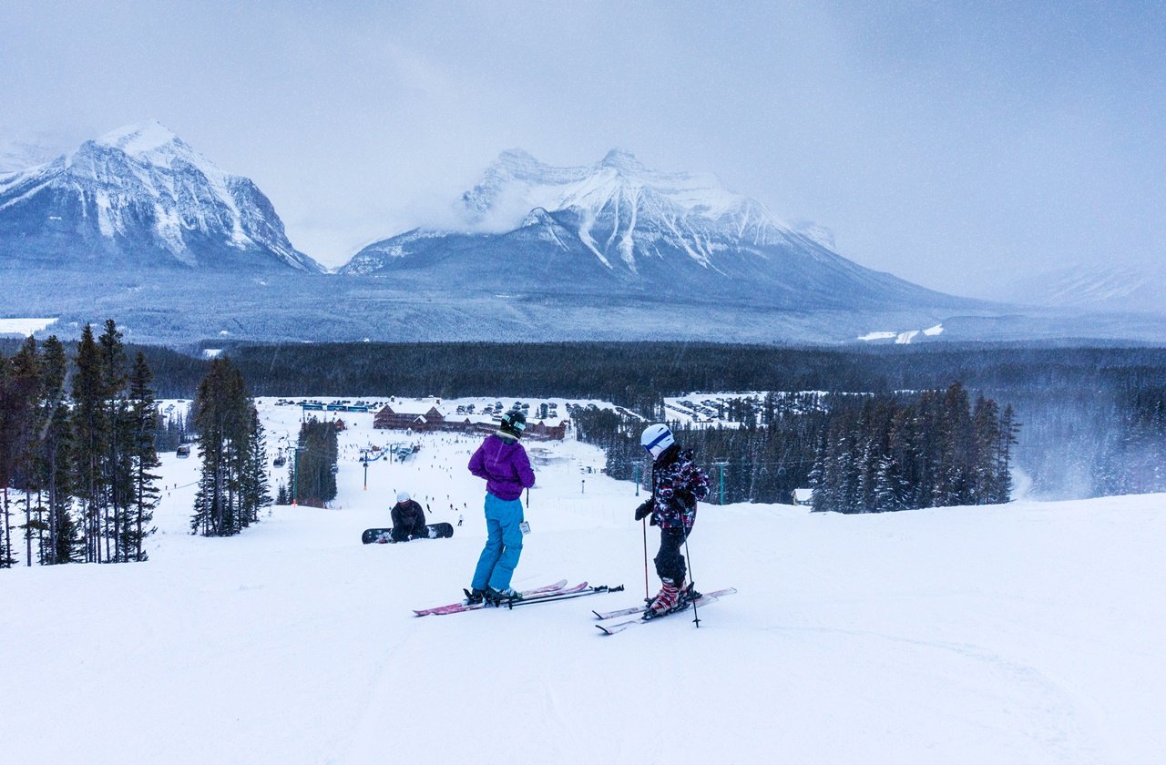 Skiers and snowboarders at Lake Louise in Banff National Park