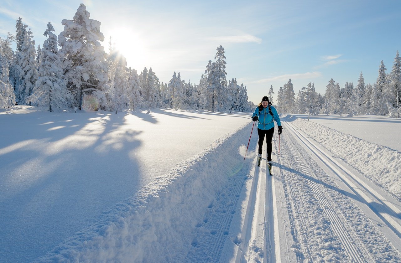 Woman skiing at a resort in Norway