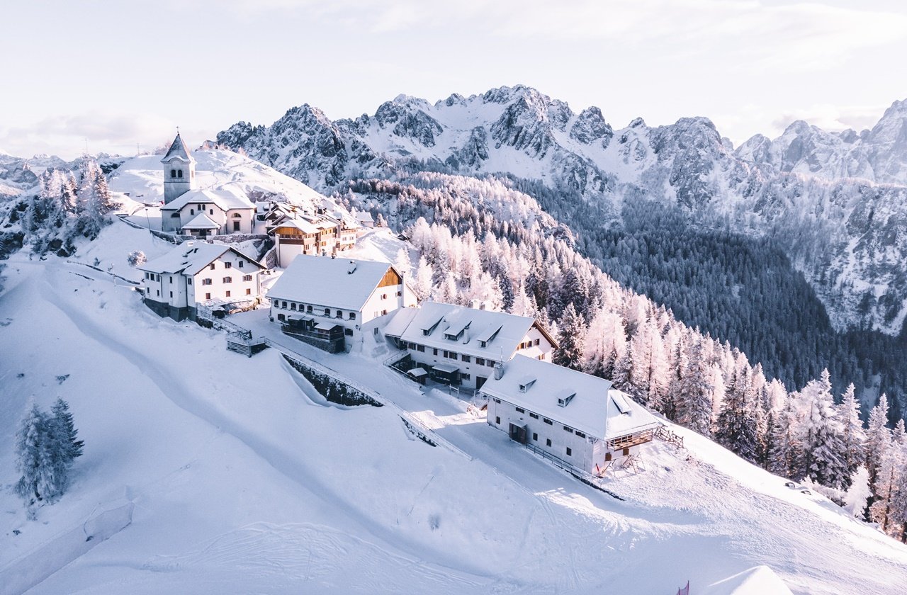Aerial view of Mount Lussari Village in winter