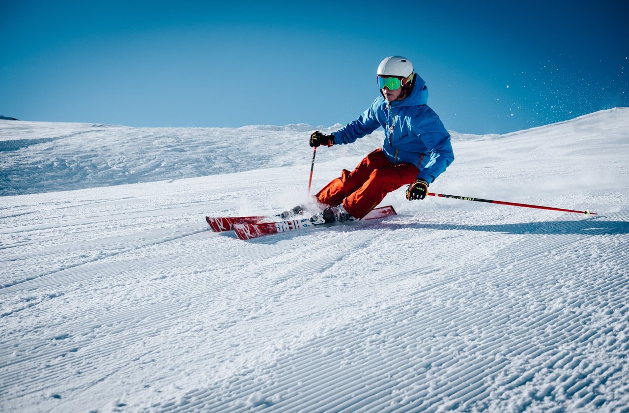 Man skiing on an empty field