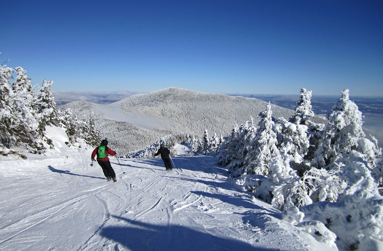 Skiers going down Smugglers Notch in Vermont