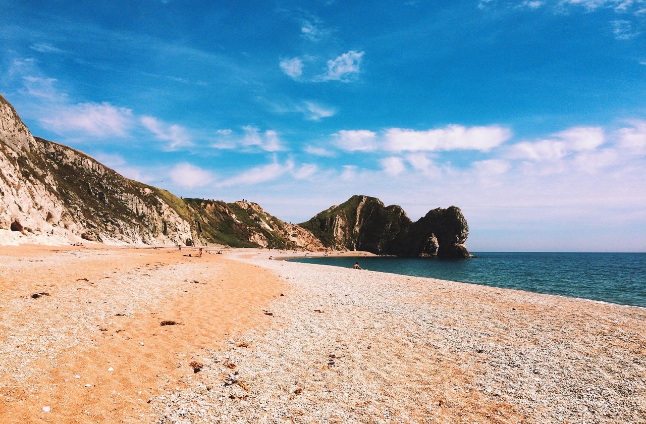 Pink sands of the beach near Durdle Door