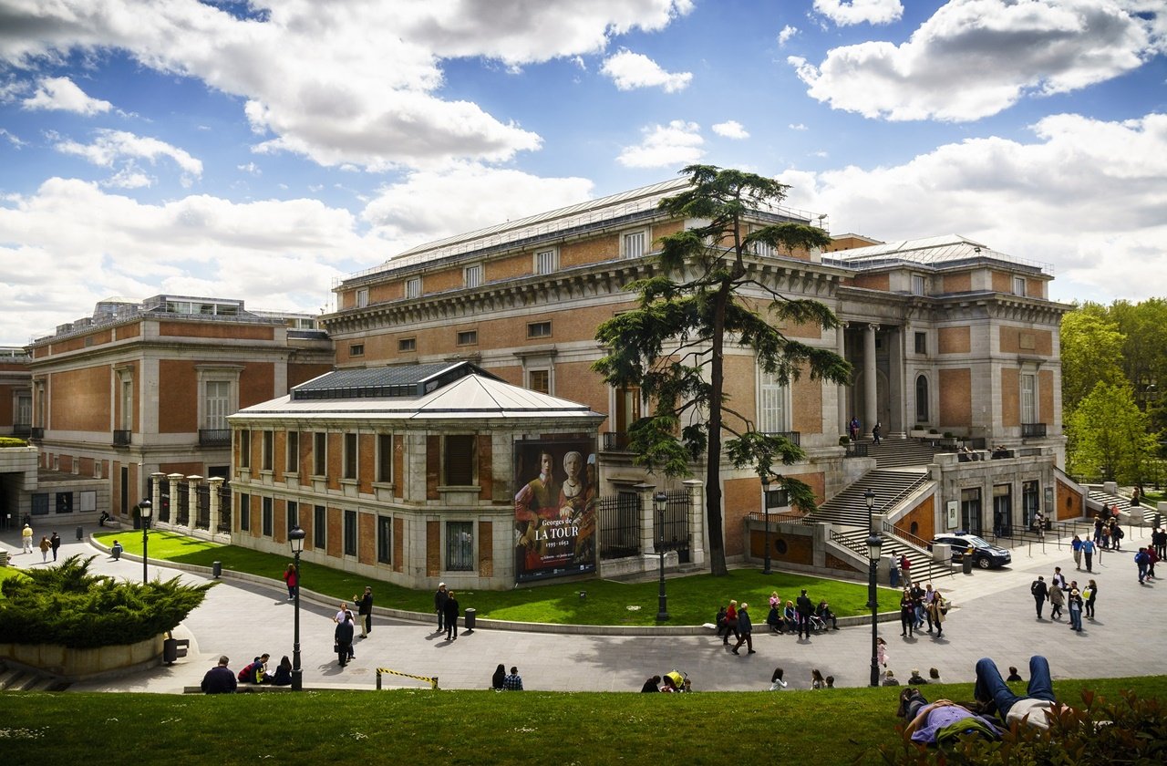 View of Prado Museum on the outside with visitors