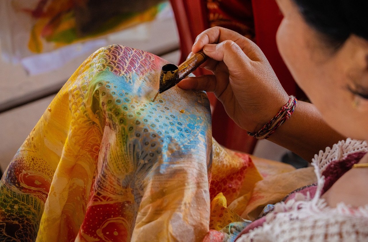 Jakarta batik art Woman making batik art
