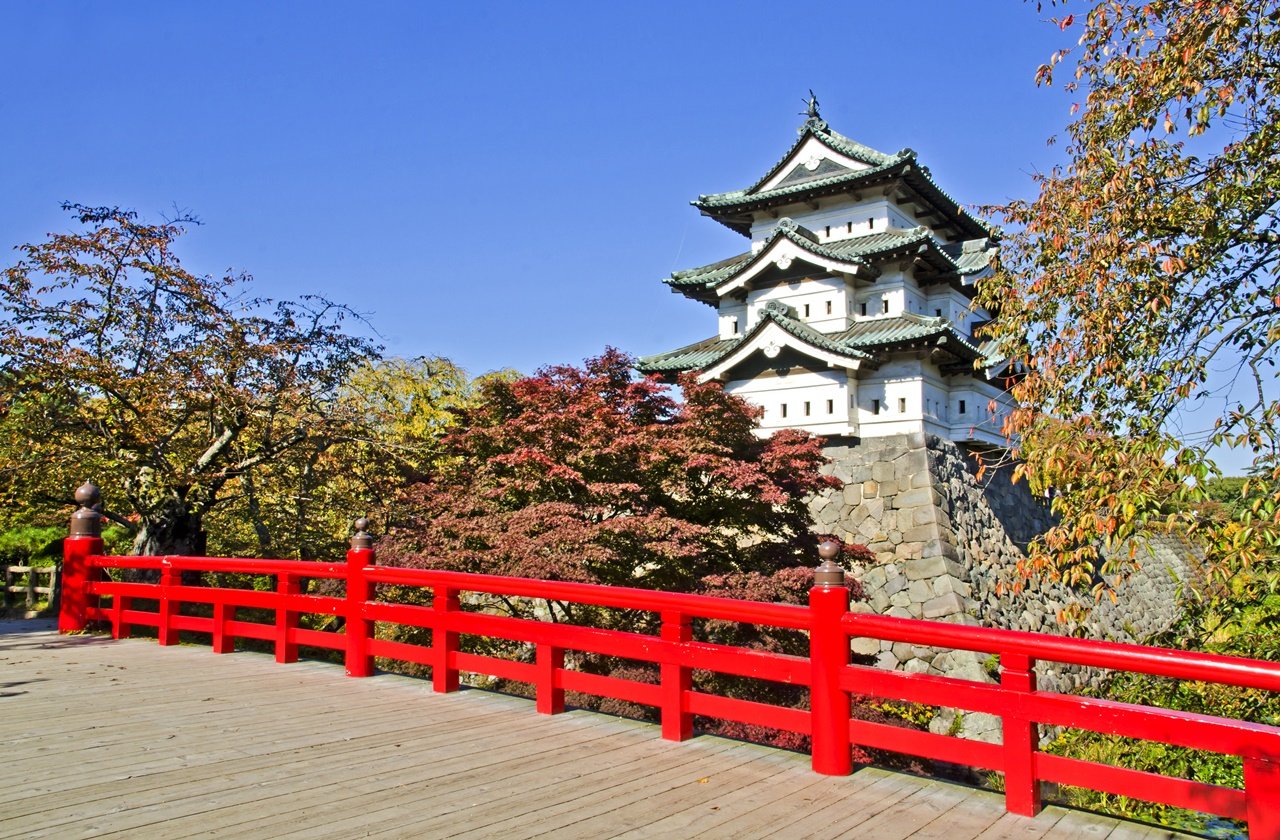 View of Hirosaki Castle from the bridge during autumn