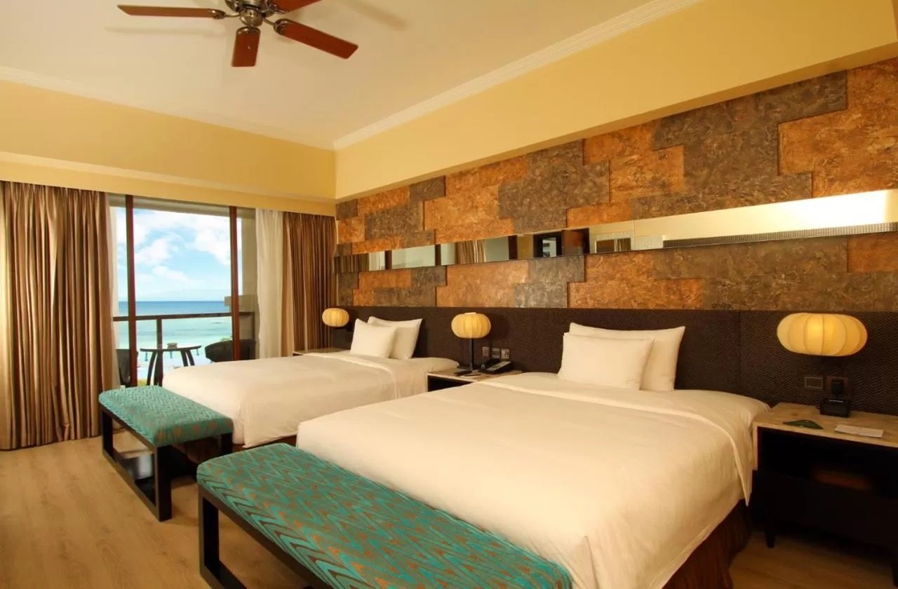 Room with terrace and beach view in The Bellevue Resort