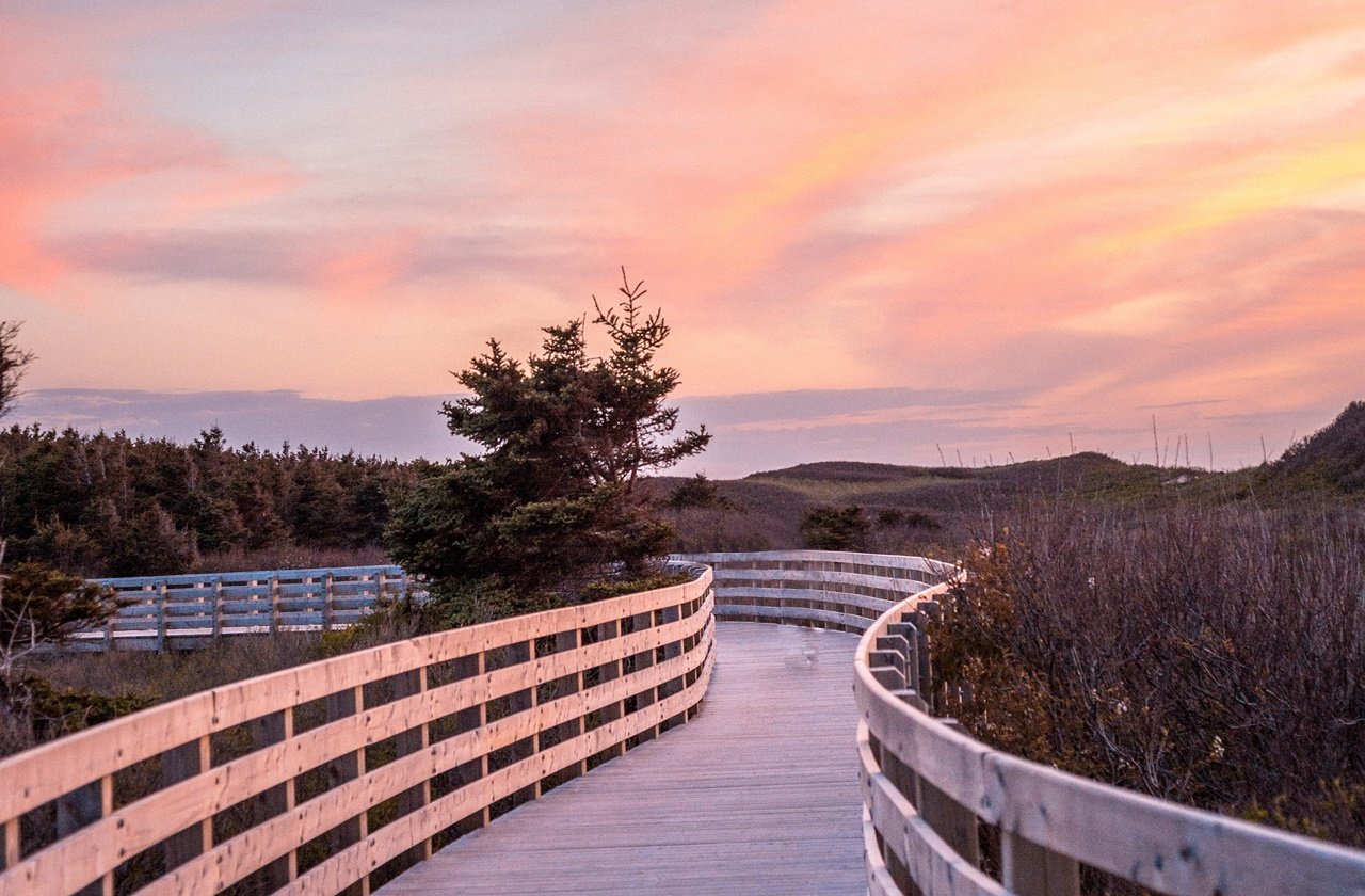Sunset at a boardwalk in Prince Edward Island National Park