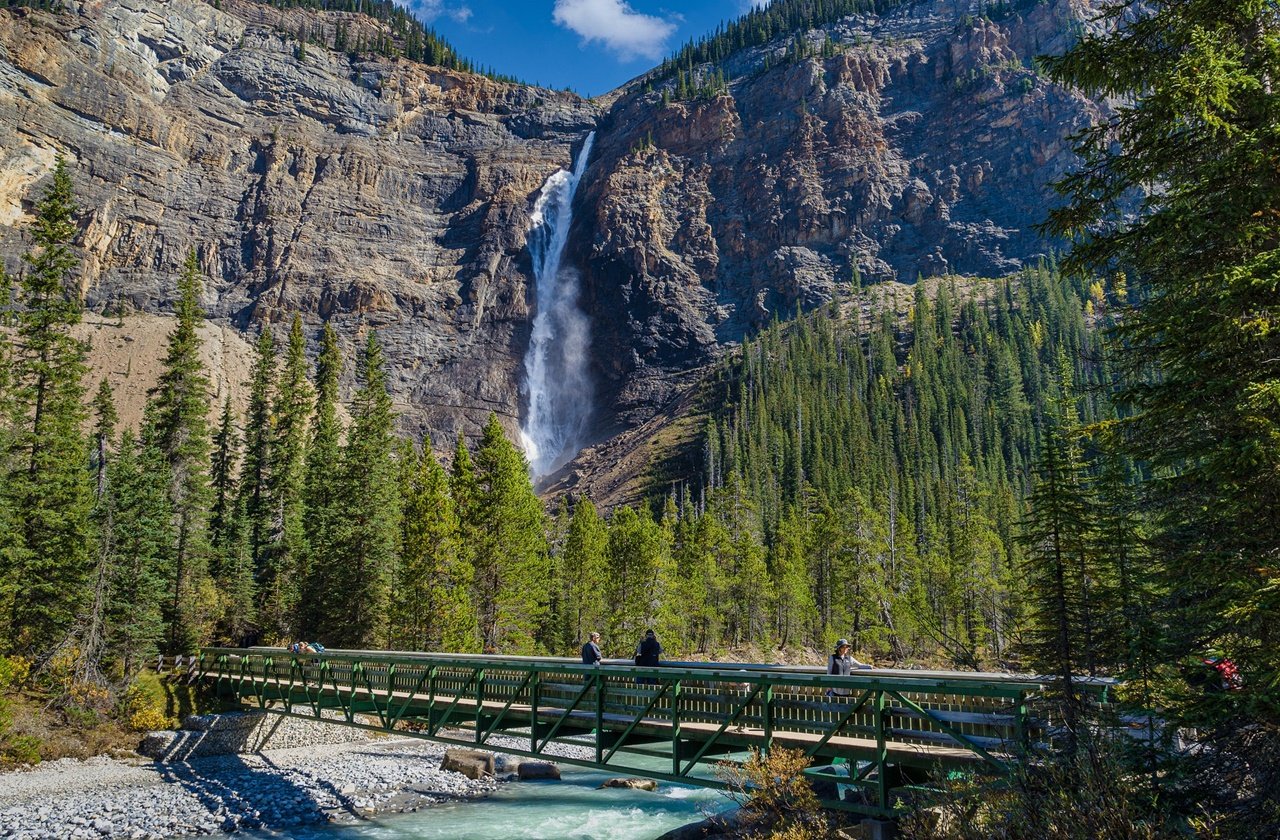 Visitors looking at the waterfalls at Yoho National Park