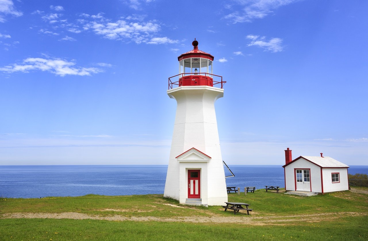 Lighthouse at Forillon National Park overlooking the ocean