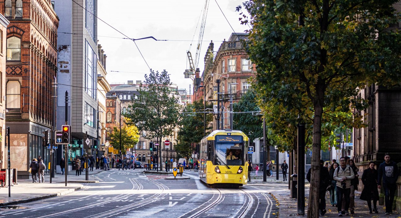 Busy streets of Manchester during the day