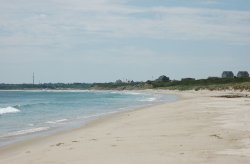 Pristine white sand shore of Mansion Beach