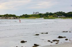 Man surfing in one of the rhode island beaches