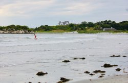 Rhode island beaches Man surfing in one of the rhode island beaches